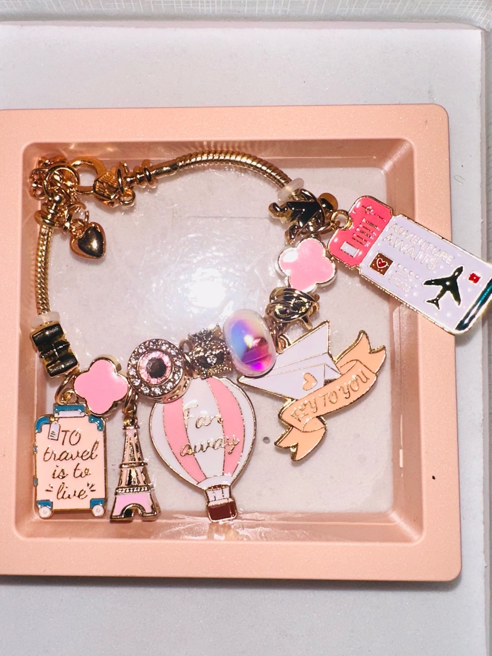 Gold-Tone Pink Enamel Travel Charm Bracelet